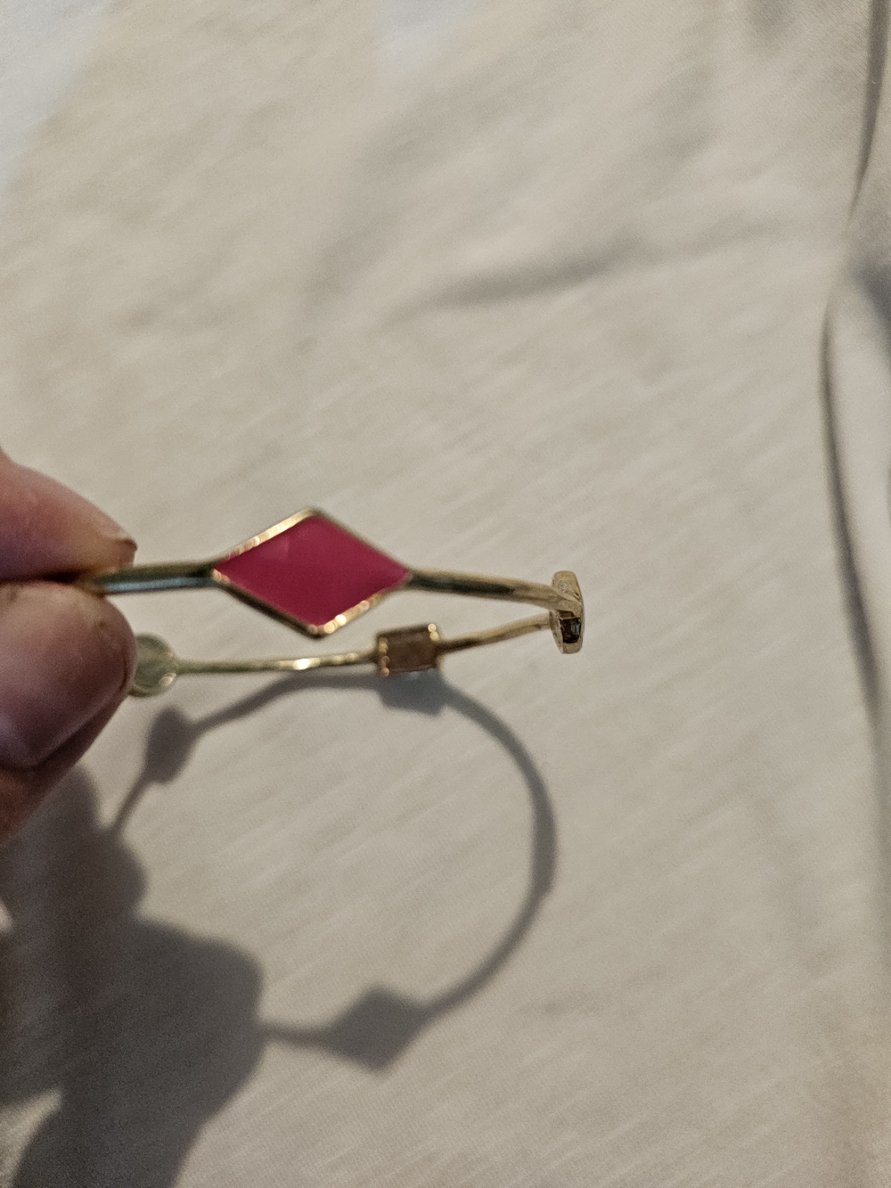 Gold Toned Bangle Bracelet with Multi Color Enamel Accent